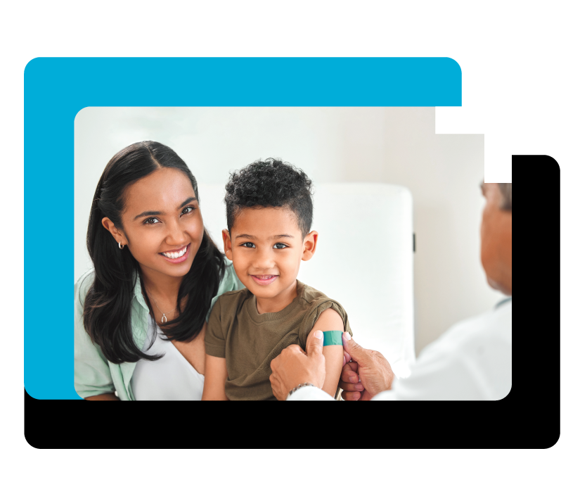 Child receiving bandage from doctor